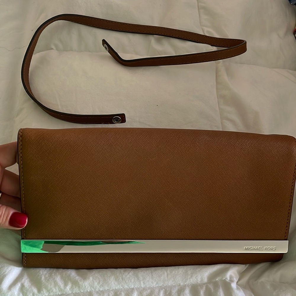 Michael Kors leather cognac colored clutch with removable strap